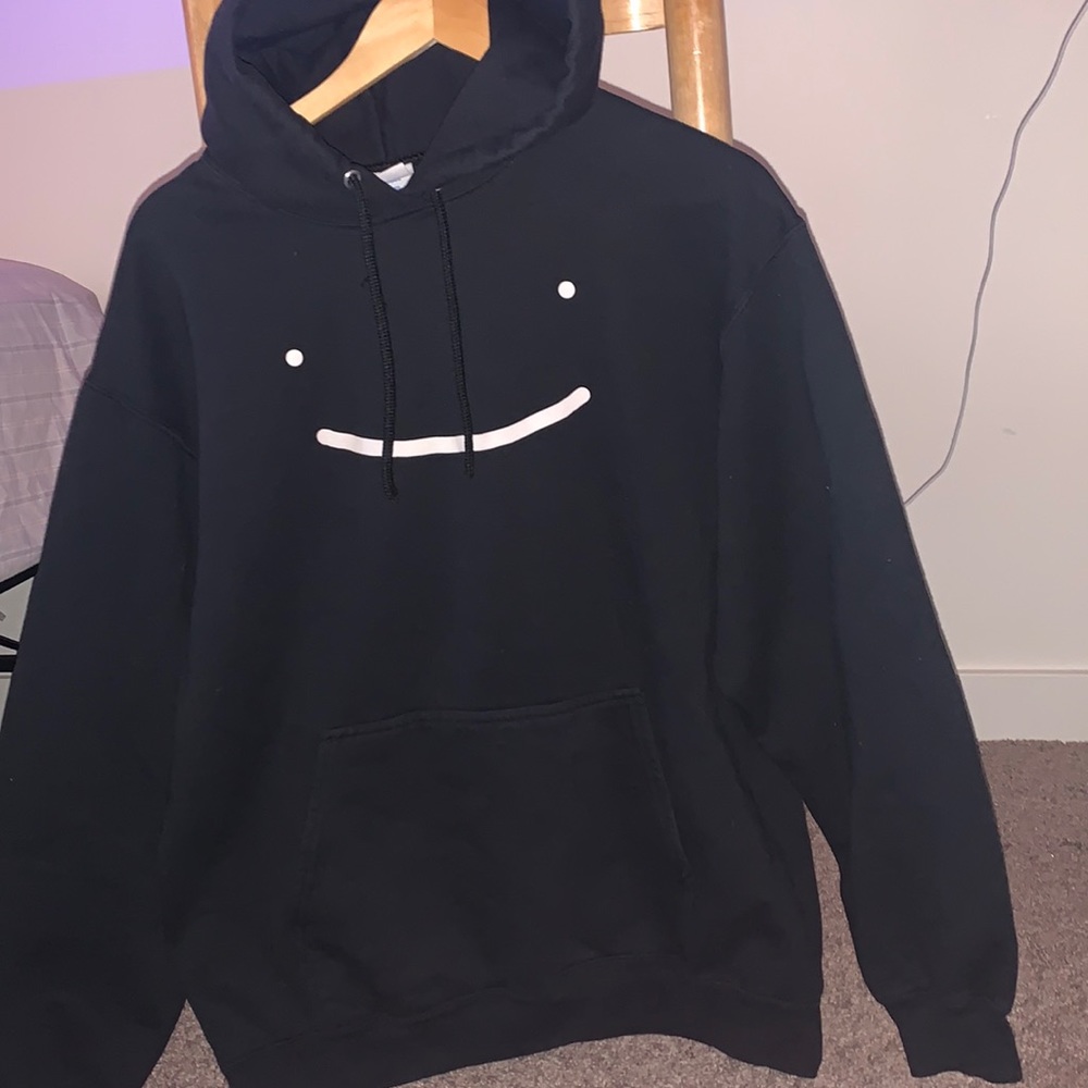 black hoodie with smiley face